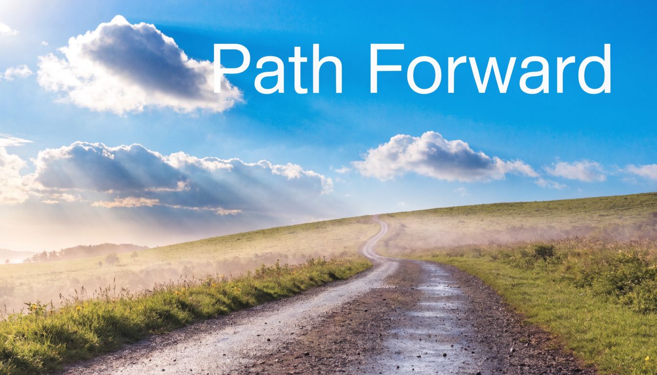 A scenic gravel road winding through a grassy hillside under a vibrant blue sky with fluffy clouds.