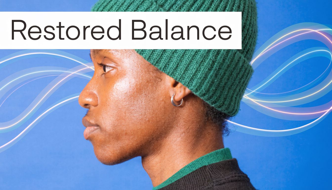 A person in profile wearing a green beanie against a blue background with abstract glowing light trails.