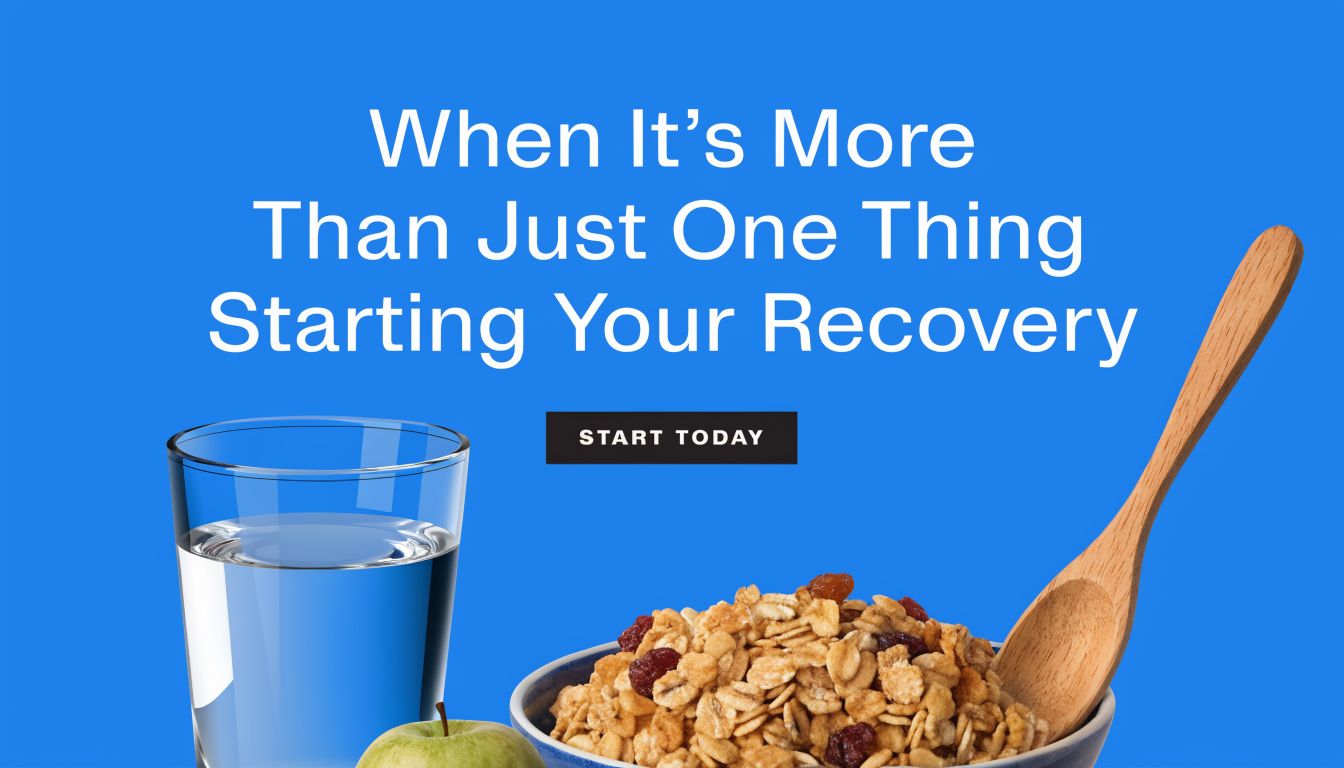 A glass of water, a fresh green apple, and a bowl of cereal with a wooden spoon.
